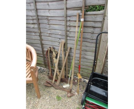 Collection of garden tools, pick axe etc