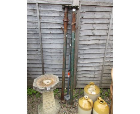 Pair of acrow props and square hammer