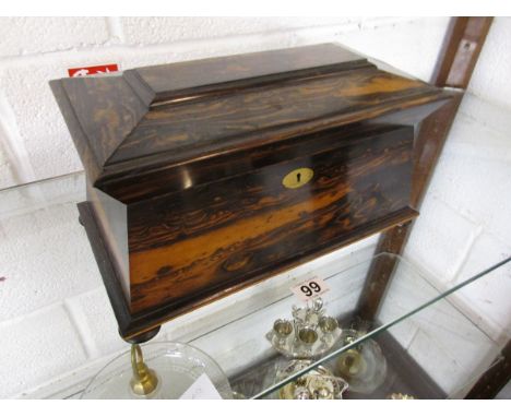 Fine Coromandel wood sarcophagus tea caddy with complete interior fittings
This piece appears to be in good condition commens