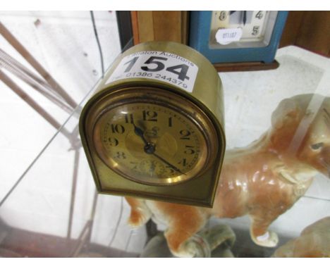 Small brass French alarm clock with Lion motif
