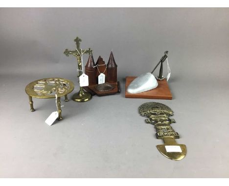 WOODEN AND METAL SHOE LAST,17.5cm wide, along with a Peruvian brass wall mounting decoration depicting a deity, a brass cruci