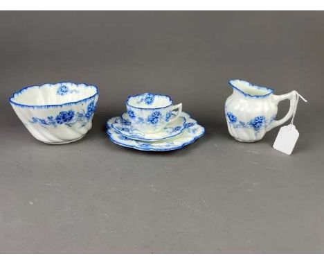 GRAFTON PART TEA SERVICE,with blue floral decoration on a white ground, comprising 12 cups, 10 saucers, 11 plates, 2 cake pla
