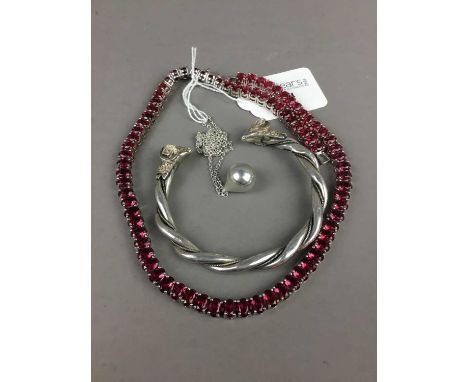 TIFFANY &amp; CO PENDANT ON CHAIN,along with a ram head bangle and a paste set necklace (3)