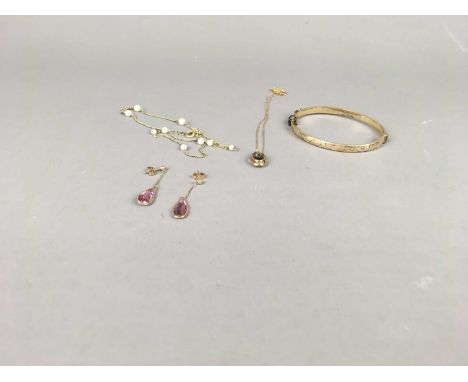 LOT OF COSTUME JEWELLERY,including a pair of drop earrings, gold plated snap bangle, pendant and necklet (4)