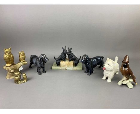 PAIR OF ONYX BOOKENDS,modelled with Scottie dogs, 16cm high, along with a pair of Goebel Spaniels, a brass figure group of ow