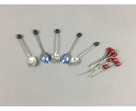 SET OF FIVE SILVER AND ENAMEL TEASPOONS,along with eight silver toothpicks