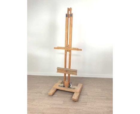 WOOD ARTIST'S EASEL,the base, 63cm wide