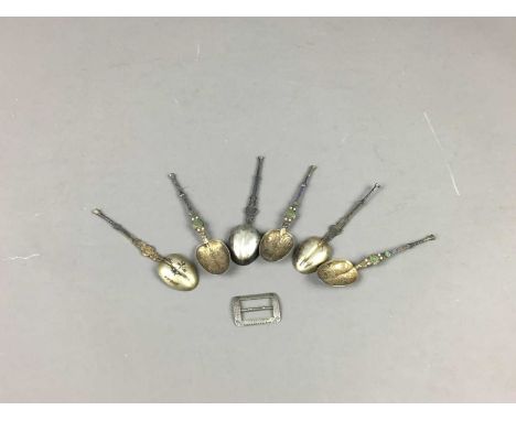 SET OF SIX SILVER AND ENAMEL TEASPOONS,along with a late Victorian silver buckle