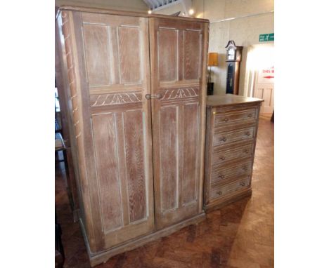 Limed oak Ercol "Reliability" chest of drawers and wardrobe. Condition report: See terms and conditions.    