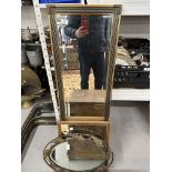 Long upright mirror, 49ins. x 15ins. Large oval mirror metal framed with leaf decoration, 23ins. x