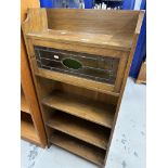 Oak narrow bookcase, stained glass cupboard with shelves below, Derry & Thomas, Kensington label