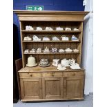19th cent. Pine dresser three shelf unit above three drawer and cupboard base. 86ins. x 62ins. x