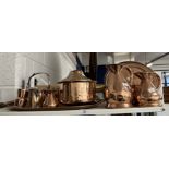 Tray, cooking pot, three graduated milk jugs, kettle, two small tankards and a bed warmer. (9)
