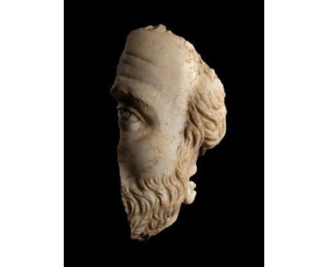 A Roman Marble Fragmentary Portrait Head of a ManCirca 1st-2nd Century A.D.Height 9 inches (23 cm).Provenance:Arthur Richter 