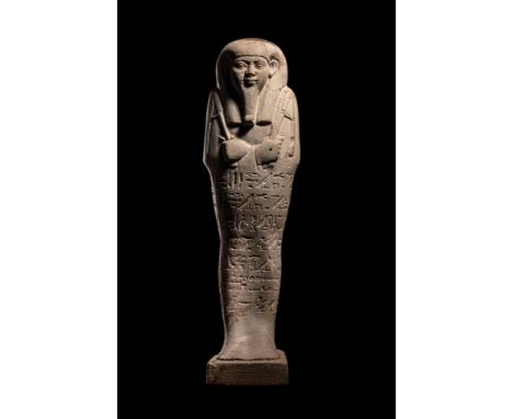 An Egyptian Faience Ushabti for HoriraaLate Period, 26th Dynasty, 664-525 B.C.Height 7 inches (17.8 cm).Property from the Col