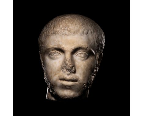 A Roman Marble Portrait Head of a ManLate Severan Period, 3rd Century A.D.Length 10 13/32 inches (26.42 cm).Provenance: Galle