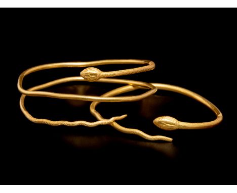 Two Romano-Egyptian Gold Snake BraceletsCirca 1st Century B.C.Diameter of largest 2 3/4 inches (7 cm).Property from a Private