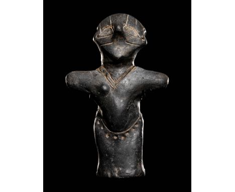 A VinÄa Terracotta Female Figure Neolithic Period, Circa 5700-4500 B.C.Height 4 inches (10.4 cm).Property from a New Jersey P