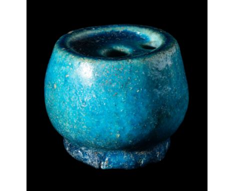 A Romano-Egyptian Faience InkwellCirca 1st Century B.C.-2nd Century A.D.Diameter 2 1/2 inches (7 cm).Collection from an Impor