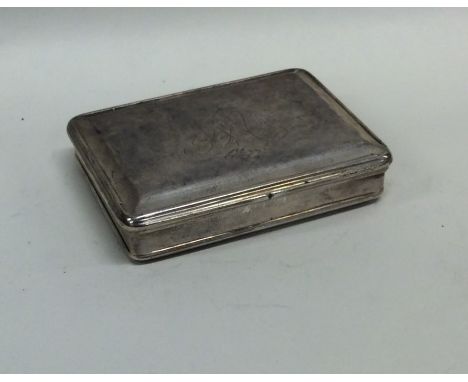 A heavy rectangular silver snuff box with hinged top to gilt interior. Approx. 103 grams. Est. £150 - £200.