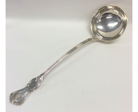 EDINBURGH: A large silver honeysuckle pattern ladle. Approx. 200 grams. Est. £120 - £150.