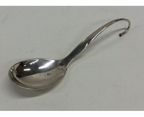 GEORG JENSEN: A stylish silver caddy spoon of typical design. Approx. 30 grams. Est. £50 - £80.