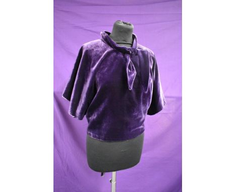 An unusual purple velvet 1930s blouse.
A repair to side, fairly discreet unless scrutinised, a few slight marks and a few sma