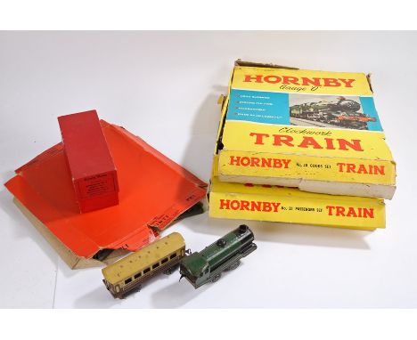 Hornby O gauge No.20 goods set, No.21 passenger set, PR1 left hand and right hand points, No.2 single arm signal, all boxed, 