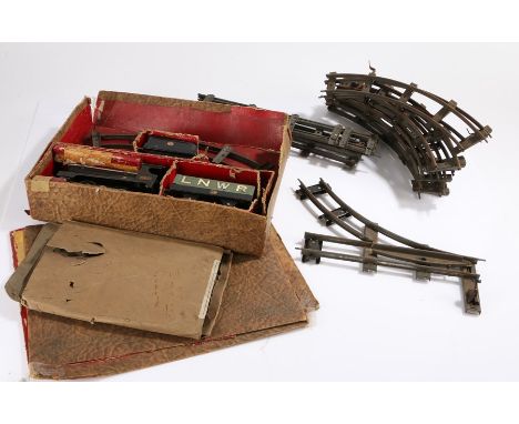 The Hornby Clockwork Train set, O Gauge, Manufactured by Meccano, the boxed set with a black engine numbered 2710, LNWR rolli