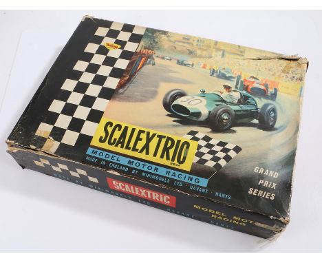 Triang Scalextric model GP.33, with Lotus and Ferrari cars, booklets, housed in original boxBoxes with splits and taped repai