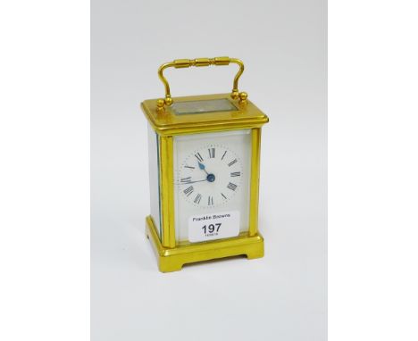 Gilt brass cased carriage clock, 12cm high excluding handle