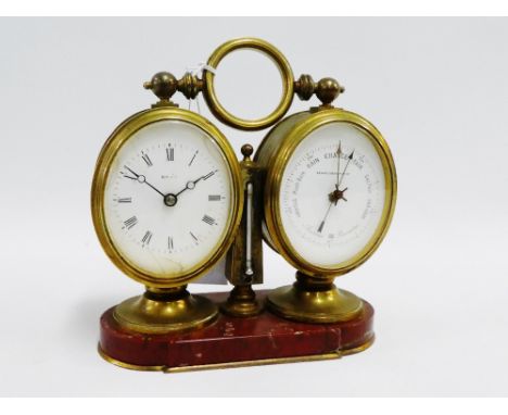 Gilt brass desk compendium, the combination with a central brass obelisk surmounted with a thermometer and flanked by oval ca