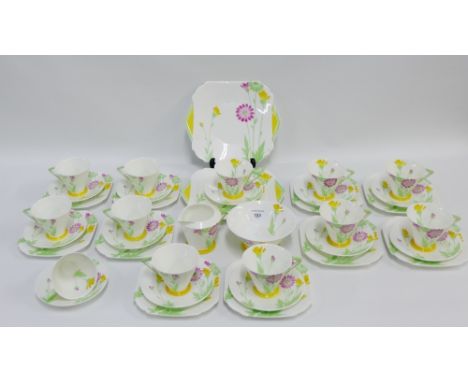 Shelley Art Deco porcelain twelve place teaset painted with pink, green and yellow flowers with printed backstamps and regist