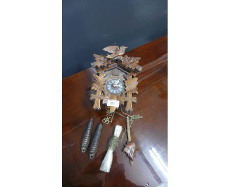 German Cuckoo clock complete with weights and pendulum