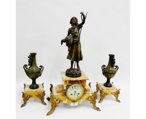 Marbled hardstone and gilt brass mounted clock garniture, the clock surmounted by a spelter figure after Faneuse over a circu