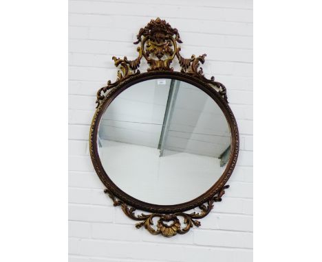 Rococo style gilt framed wall mirror, size overall 110 x 70 cm 