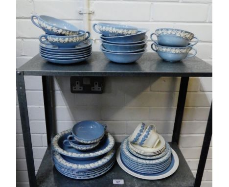 Quantity of Wedgwood embossed Queens ware blue and white table wares to include plates, bowls, serving dish, cups, saucers et