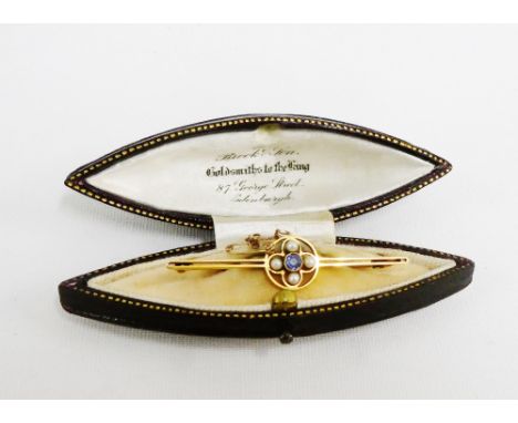 15 carat gold seed pearl and gemset bar brooch, in fitted box, 5cm long 