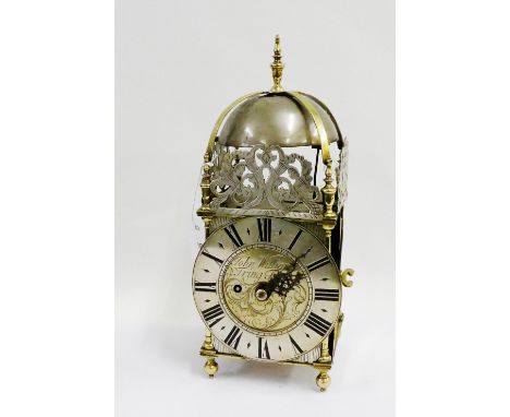 Brass lantern clock, with brass chapter ring having Roman numerals, enclosing a foliate engraved centre inscribed John Willia