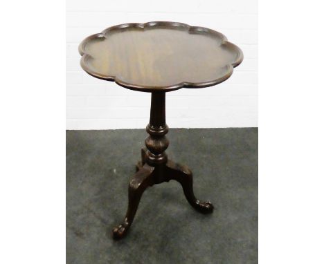 Mahogany side table on a baluster column and carved tripod base, 73 x 53cm