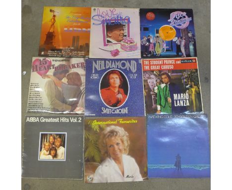 A box of approximately 30 1960's and later LP records including Buddy Holly and Motown, etc. 