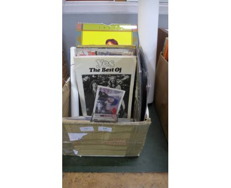 Music memorabilia; a box of music items with tour programmes for The Rolling Stones (1982), AC/DC and The Cranberries, signed