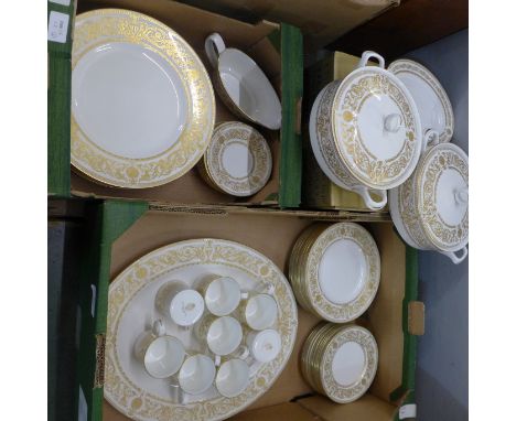 A Royal Worcester Hyde Park 1966 dinner service comprising ten dinner plates, a meat plate, eight coffee cups and saucers, te