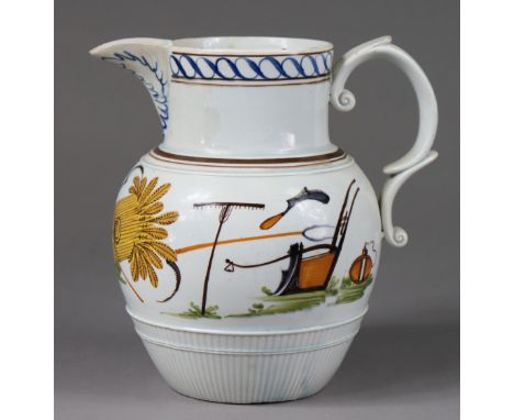 An early 19th century Prattware bulbous jug painted with a wheatsheaf &amp; various farming implements, the pearlware body wi