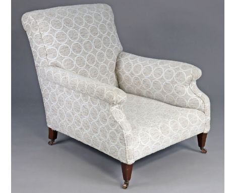 HOWARD & SONS, a 19th century easy chair with down-swept arm supports & deep seat, upholstered in light grey geometric materi
