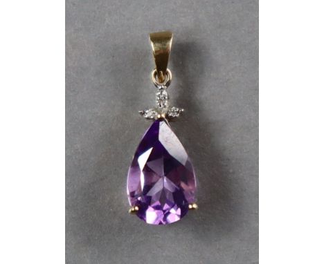 An amethyst pendant, the pear-shaped stone with trio of tiny diamonds, set too 9ct gold mounts; 2cm high (1.8gm).