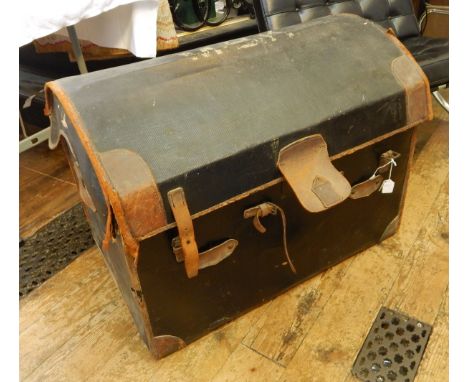Domed leather travelling trunk with fitted tray, leather trimmed, but worn, initialled 'MBK' fading on the top, 84cm wide 