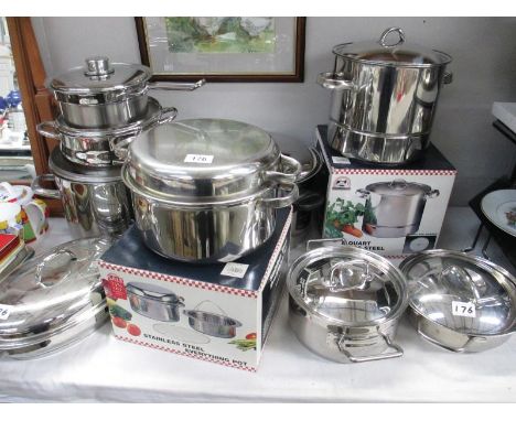 A quantity of vintage stainless steel saucepans/cookware, mainly new