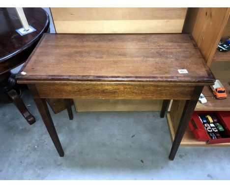 An Edwardian card table