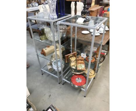 A pair of metal &amp; glass display shelf units